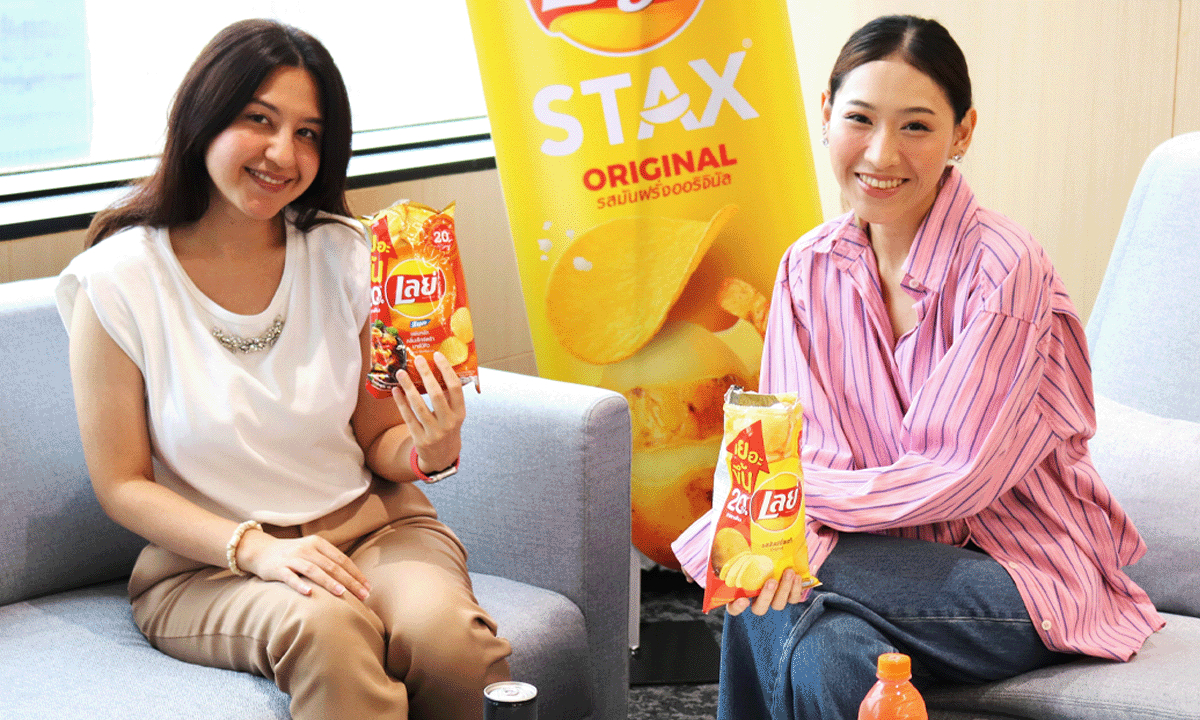 Female employees of different nationalities enjoying Lay's together