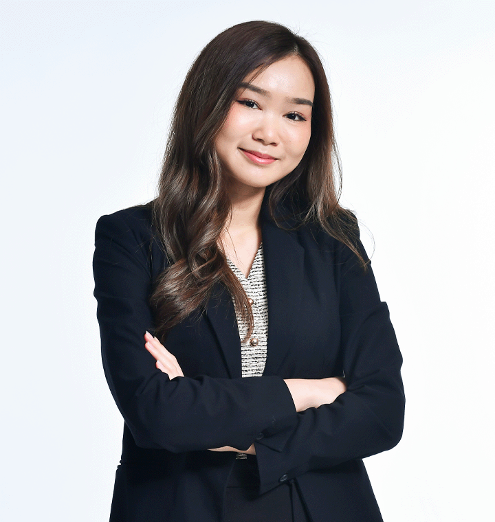 Woman smiling with her arms crossed